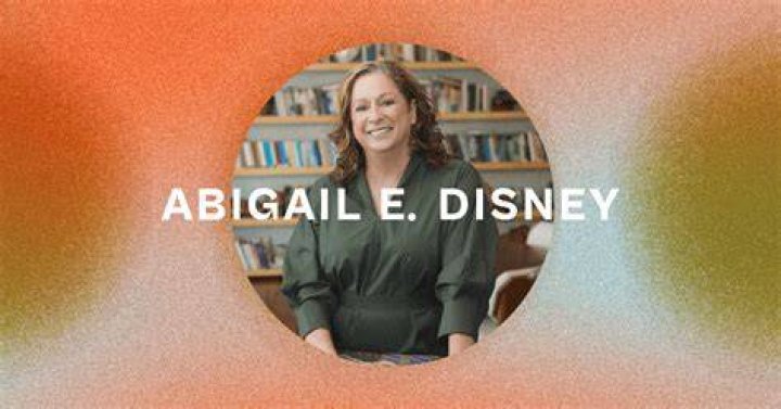Abigail Disney with her pet on a vacation