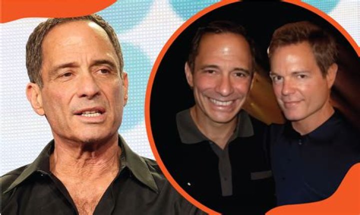 Andy Maurer and Harvey Levin going out for a walk by wearing shorts.