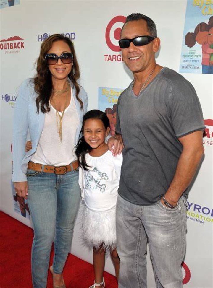Angelo Pagan along with his three sons