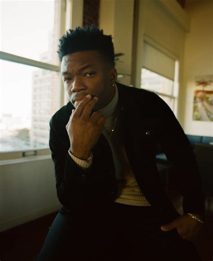 Caleb Castille posing for a photo shoot.