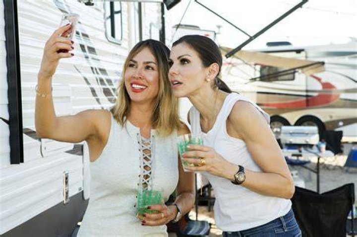 Kelly Dodd taking the selfie with ex-husband Michael Dodd and daughter Jolie Dodd.