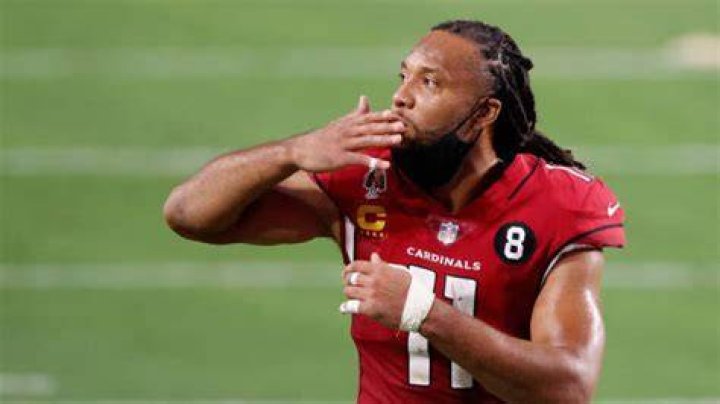 Larry Fitzgerald's son, Devin Fitzgerald with his former girlfriend, Angela Nazario. What's Larry Fitzgerald's current marital status?