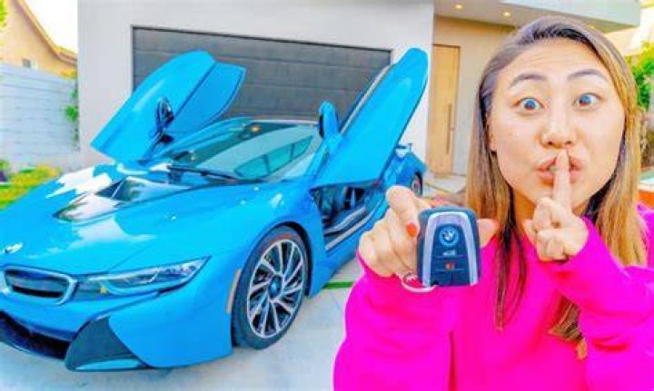 Lizzy Sharer And Her Expensive Car