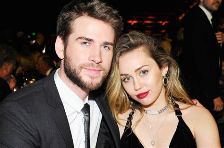 Update on Liam Hemsworth’s life after the divorce! Liam spotted ringless with friends and family while Miley openly shows PDA with Kaitlynn Carter! Miley Cyrus and Liam Hemsworth file a divorce after seven month s of marriage