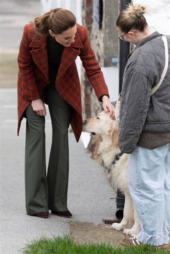 Princess Kate petting a dog