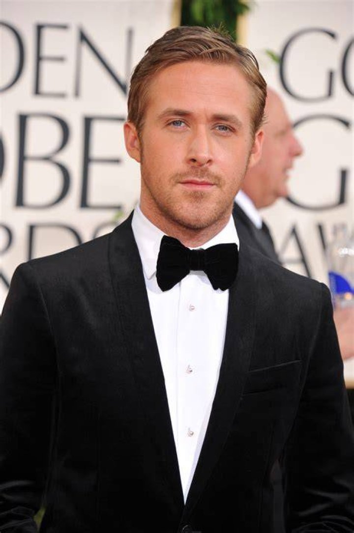 Ryan is wearing a black shirt that is tucked in.