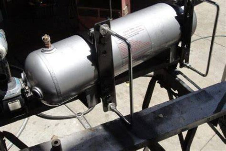 When should air tanks be drained?